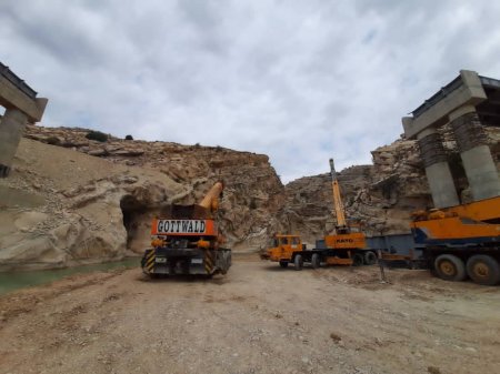 گزارش تصویری از تیرگذاری پل شهرستان لنده گزارش تصویری از تیرگذاری پل شهرستان لنده