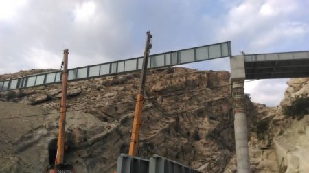 گزارش تصویری از تیرگذاری پل شهرستان لنده گزارش تصویری از تیرگذاری پل شهرستان لنده
