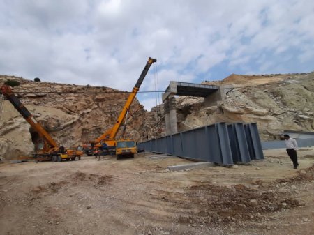 گزارش تصویری از تیرگذاری پل شهرستان لنده گزارش تصویری از تیرگذاری پل شهرستان لنده